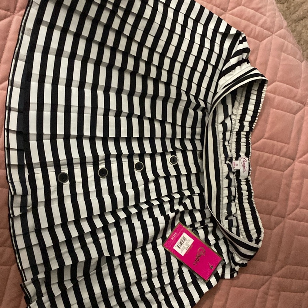 A black and white skirt . Candies brand . Brand new . Size small